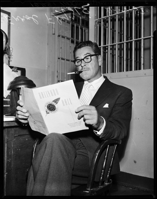 Errol Flynn under arrest. Reads. October 19, 1957