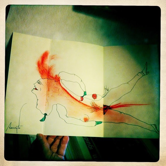 antonio beneyto dibuja un ex libris en un poemario de roser amills