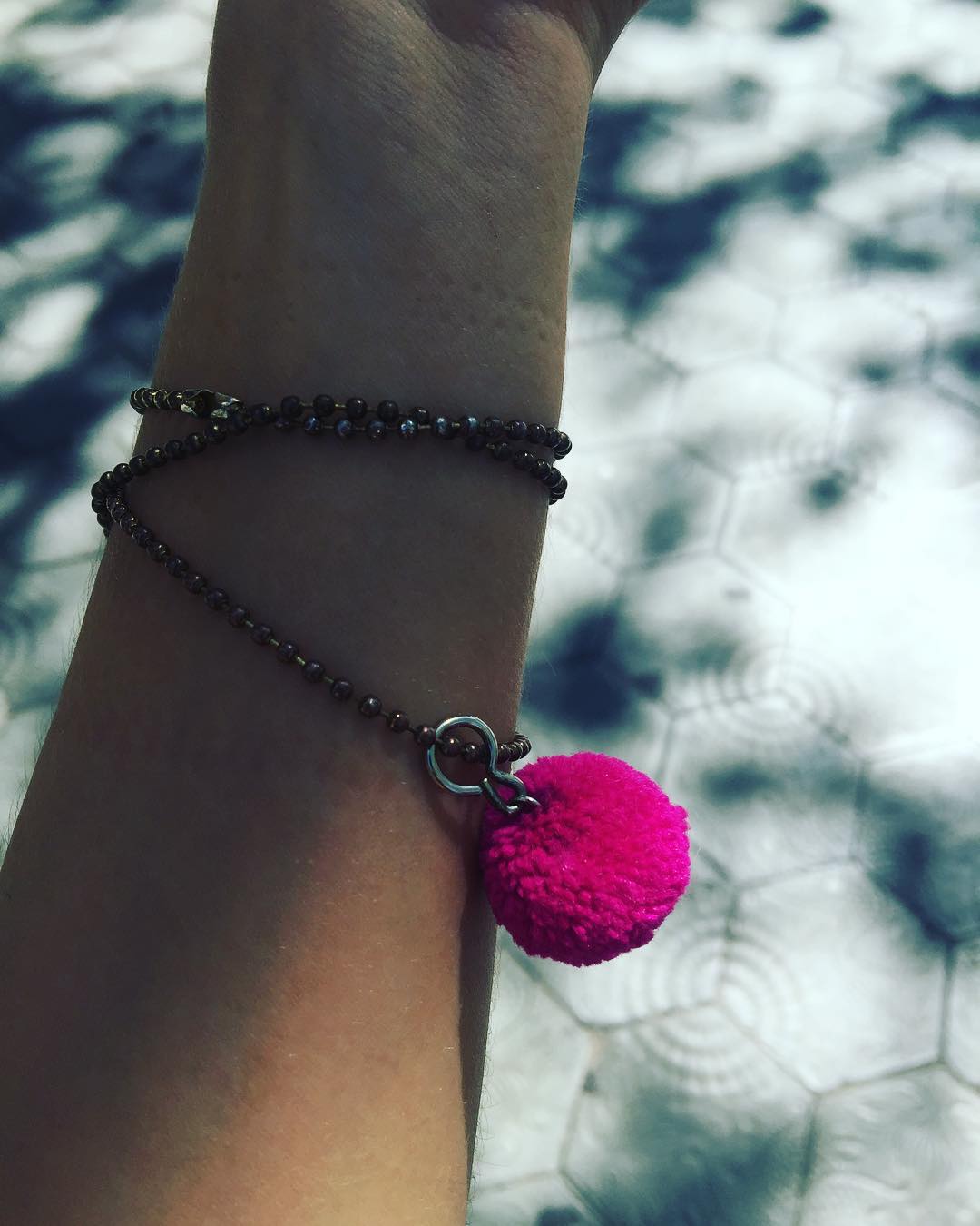 Pulsera Pompon Rosa